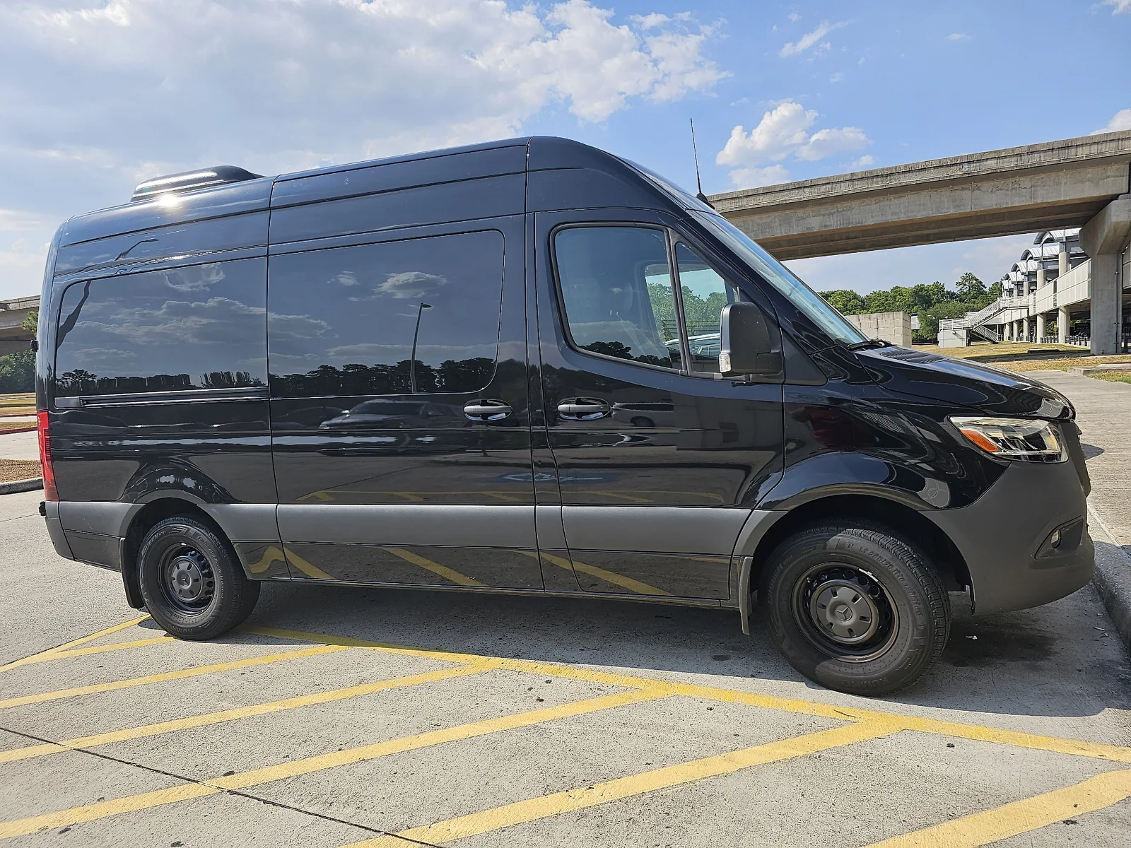 Black Mercedes Sprinter van for groups of up to 14 from Hobby Airport to Galveston